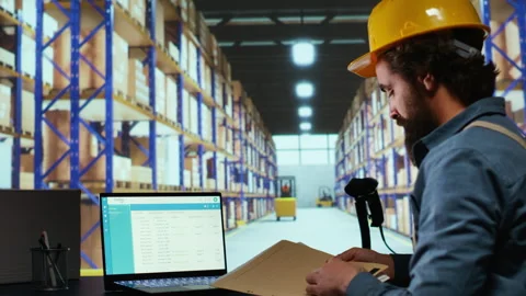 Export supervisor drafting billing for product logistics Stock Footage 257497546