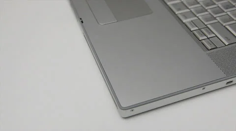 Exporting a dvd from silver laptop Stock Footage 22478790