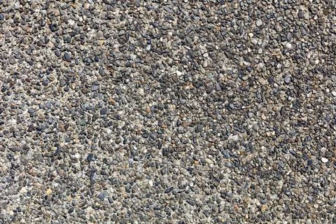Exposed aggregate concrete background Stock Photos