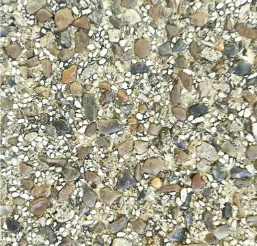 Exposed aggregate concrete pebble pavement texture background Stock Photos
