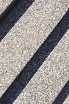 Exposed Aggregate Concrete Steps and Shadows Texture Background Stock Photos