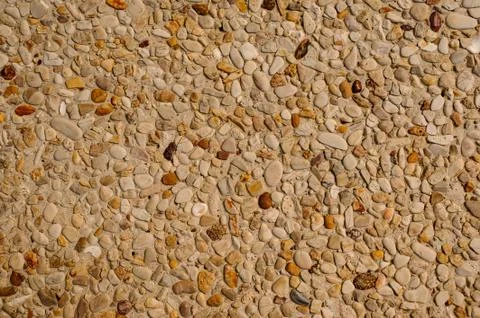 Exposed aggregate concrete texture background Stock Photos