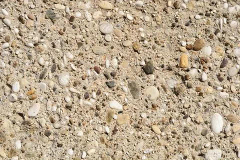 Exposed Aggregate Concrete Texture with River Stones Stock Photos