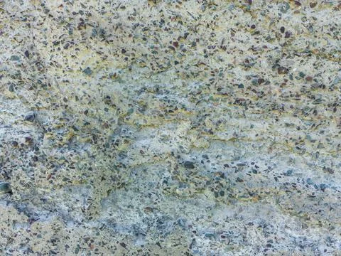 Exposed aggregate concrete texture, rough surface Foto stock