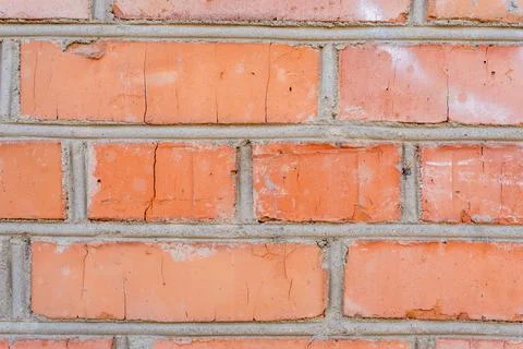 Exposed brick wall showcasing weathered textures and colors Stock Photos