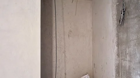 Exposed Concrete Ceiling with Electrical Wiring During Renovation Stock Footage 338372999