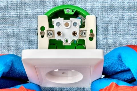Exposed electrical power point during installation. Stock Photos