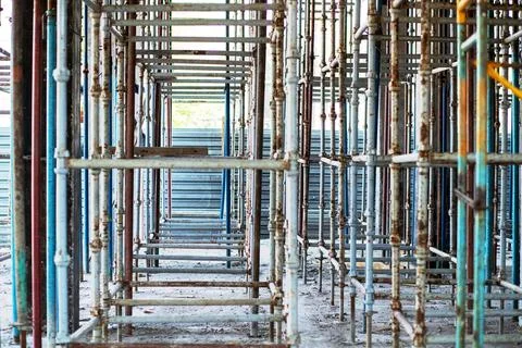 Exposed scaffolding under the ceiling for pouring concrete at a construction Stock Photos