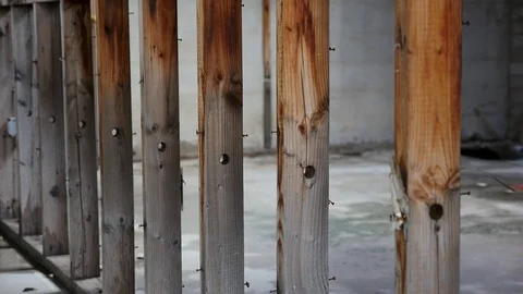 Exposed wall studs in a rundown building Stock Footage 72562116