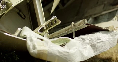 Exposed Wing Structure and Insulation of a Scrapped Aircraft, Sunlit, Close Up Stock Footage 340311661