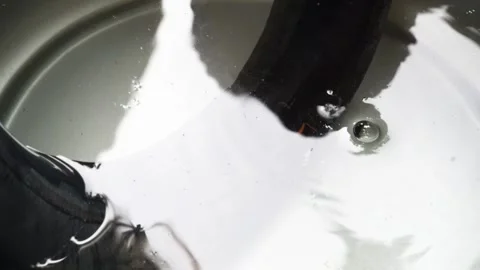 Exposing Tyre Leak with Water Stock Footage 276423788