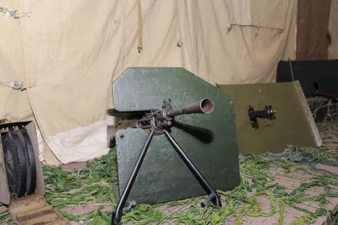 Exposition of machine guns with protection. Stock Photos