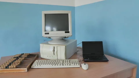 Exposition Of Old Style Computer, Retro Abacus Counting Frame And Laptop Stock Footage 287872359