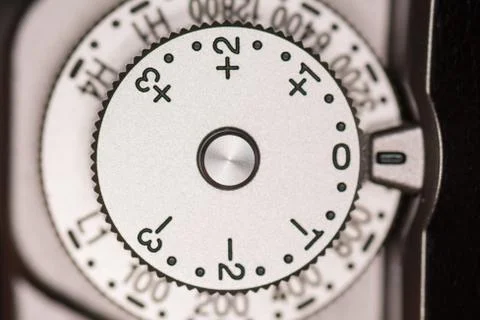 Exposure compensation dial on camera Stock Photos