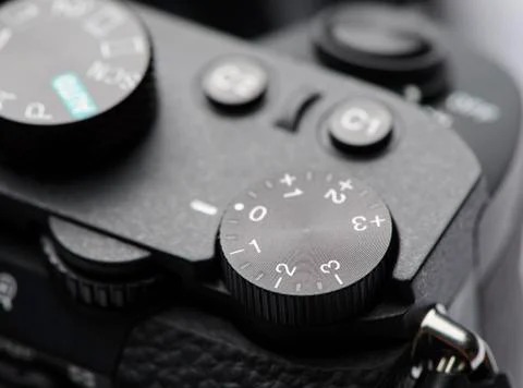 Exposure control dial on mirrorless camera Stock Photos
