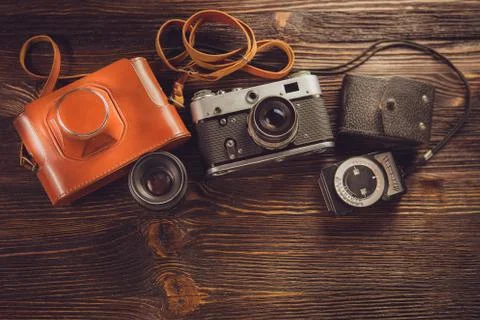Exposure meter and retro camera Stock Photos