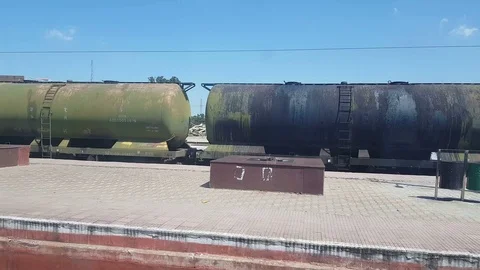 Express passenger train is passing though a railway station Stock Footage 96274663