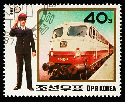 Express Train and Traffic Controller on postage stamp Stock Photos