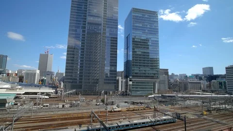 The express train approaching to the Tokyo railway station, Japan Stock Footage 106715936