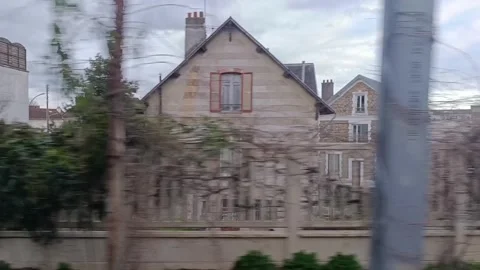 Express Train Ride in Paris Suburb, tracking shot Stock Footage 303350911