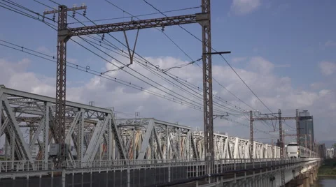 Express Train on Yodo River Bridge in Osaka, Japan Stock Footage 58720086