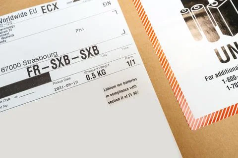 Express Worldwide EU TECH package with DHL logotype from the Syncreon Technology Foto stock