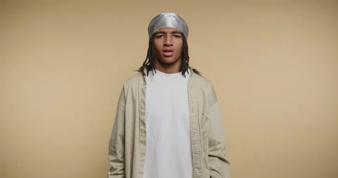 Expressing a bold message through gestures of confidence and defiance captu.. Stockbeeldmateriaal 329111687