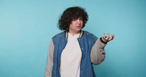 Expression of confusion and questioning in four frames with a person agains.. 動画素材 328247207