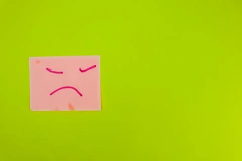 An expression drawn on a sticky note on a lime color background. Stock Photos