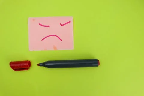 An expression drawn on a sticky note with a red marker on a lime color backgr Stock Photos