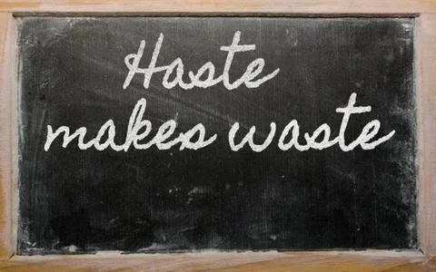 Expression -  haste makes waste - written on a school blackboard with chalk Stock Illustration