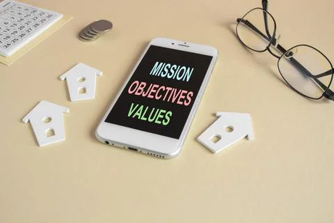 The expression Mission objectives values on the mobile phone screen. Foto stock