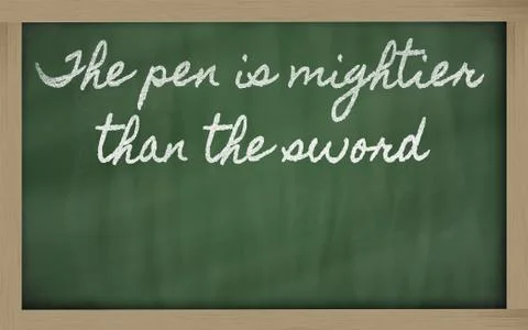 Expression -  the pen is mightier than the sword - written on a school blackb Stock Photos