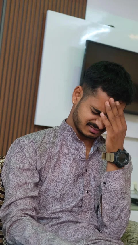 Expression of Stress or Headache with Hand on Face Stock Footage 330738499