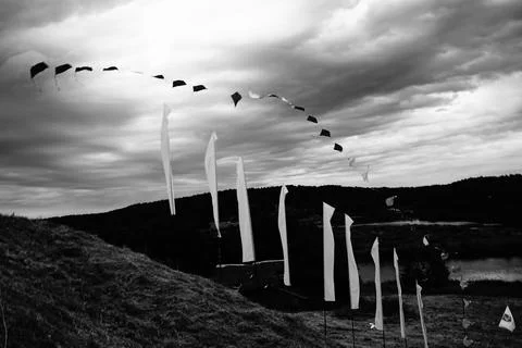 Expression of white flags against the background of a storm Stock Photos