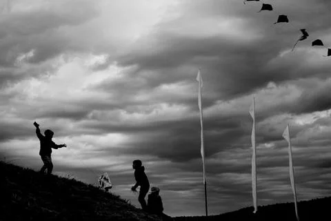 Expression of white flags against the background of a storm Stock Photos