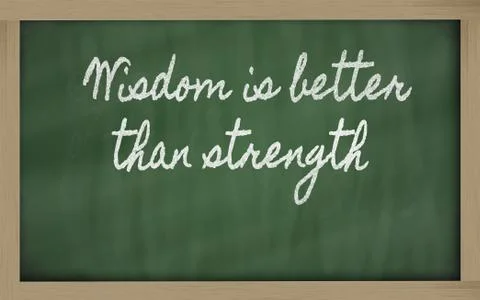 Expression -  wisdom is better than strength - written on a school blackboard Stock Photos