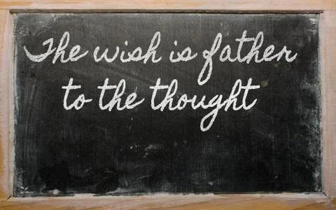 Expression -  the wish is father to the thought - written on a school blackbo Stock Illustration