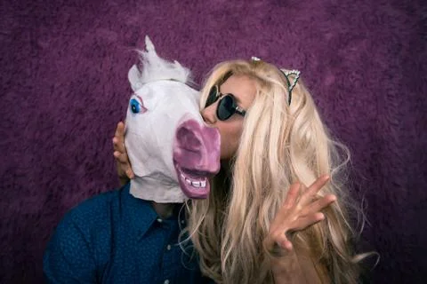 Expressive blond with strange guy Stock Photos