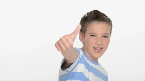 Expressive caucasian boy showing in the camera the thumbs up Stock Footage 41771765