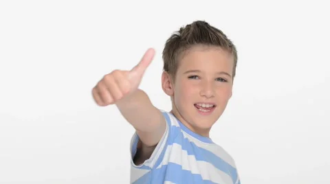Expressive caucasian boy showing in the camera the thumbs up Stock Footage 41771774
