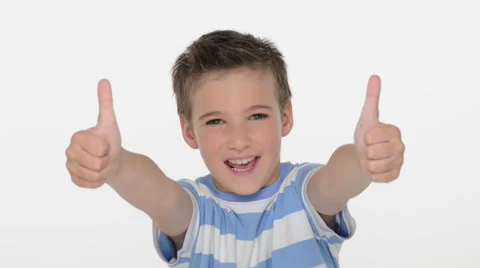Expressive caucasian boy showing in the camera the thumbs up Stock Footage 41771802