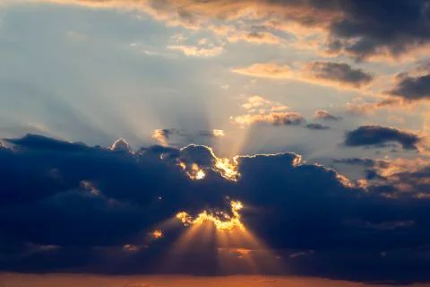The expressive contrast of the clouds in the sky and sun. The nature and beau Stock Photos