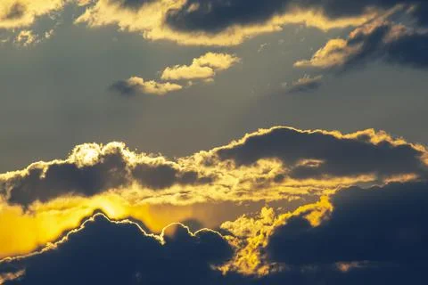 The expressive contrast of the clouds in the sky and sun. The nature and beau Stock Photos