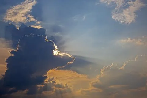 The expressive contrast of the clouds in the sky and sun. The nature and beau Stock Photos