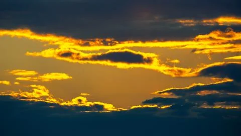 The expressive contrast of the clouds in the sky. sunset with bright clouds Stock Photos