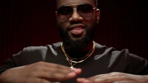 The expressive dancer moves effectively on the studio video. Slo-mo African for Video stock 144615694