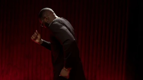 The expressive dancer moves effectively on the studio video. Slo-mo African for Stock-Footage 144615825