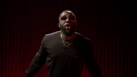 The expressive dancer moves effectively on the studio video. Slo-mo African for Stock Footage 144616122