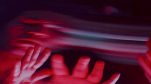 Expressive Dancer Performing in front of Distorting Mirror under Red Light Stock Footage 289859381
